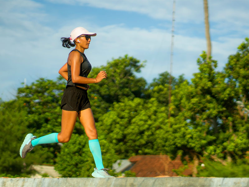 runner wearing compression therapy socks